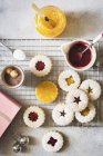 Top view of cashew Linzer cookies with fruit jams — Stock Photo