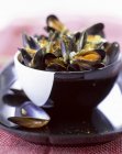 Curried mussels in the bowl — Stock Photo
