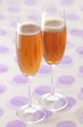 Closeup view of two glasses of Kir Royal cocktails — Stock Photo
