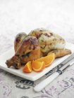 Roasted Chicken with orange slices — Stock Photo