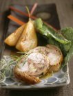 Saddle of rabbit with pears — Stock Photo