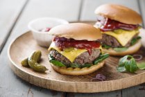 Beef burgers with ketchup — Stock Photo