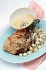 Veal chop with celery — Stock Photo