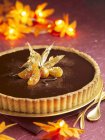 Chocolate and physalis tart — Stock Photo