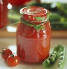 Tomato coulis in jar — Stock Photo