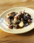 Rabbit baranccini with olives — Stock Photo
