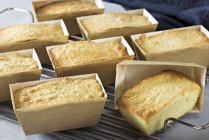 Taking Financiers out of their moulds — Stock Photo