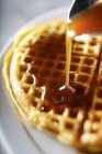 Waffles with maple syrup — Stock Photo