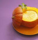 Pumpkin soup on plate — Stock Photo
