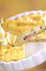 Closeup view of mussel Quiche pie piece on server — Stock Photo