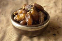 Bowl of dried dates — Stock Photo