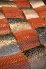 Slabs of raw uncooked salmon — Stock Photo
