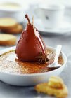 Closeup view of spiced pear on Creme Brulee — Stock Photo