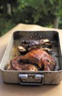 Roasted pork in baking pan — Stock Photo