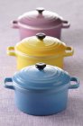 Closeup view of three colored casserole dishes — Stock Photo