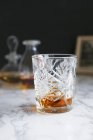 Cognac in a vintage glass — Stock Photo