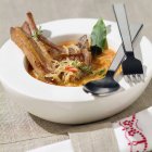 Lamb chops with vermicellis soup — Stock Photo