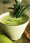 Asparagus soup in pot — Stock Photo