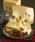 Emmental cheese on desk — Stock Photo