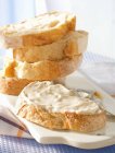 Cream cheese on bread — Stock Photo