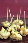 Closeup view of mussel Tempura with toothpicks — Stock Photo