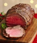 Partly sliced roasted Beef — Stock Photo