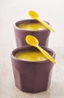 Closeup view of lemon curd with spoons in bowls — Stock Photo