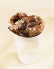 Closeup view of Rosquillas in white paper cup — Stock Photo