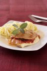 Saltimbocca meat roll with linguine pasta — Stock Photo
