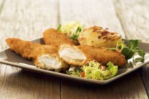 Chicken breasts on plate — Stock Photo