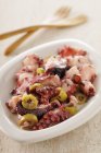 Octopus salad in bowl — Stock Photo