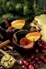 Glasses of Mulled wine with cinnamon sticks — Stock Photo