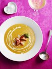Closeup view of lobster Bisque creamy seasoned soup — Stock Photo