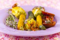 Courgette flowers on plate — Stock Photo