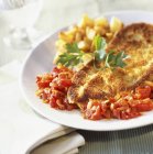 Breaded escalope on plate — Stock Photo