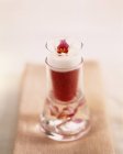 Closeup view of drink with strawberry, cocos and orchid — Stock Photo