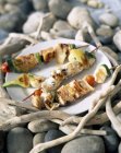 Chicken brochettes  on plate — Stock Photo