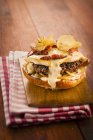 Hamburger with Raclette cheese — Stock Photo