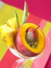 Closeup view of exotic fruit selection in glass — Stock Photo