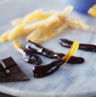 Candied orange in chocolate — Stock Photo