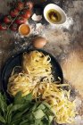 Homemade tagliatelle pasta on plate — Stock Photo