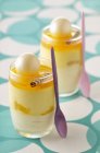 Passion fruit mousse in glass cups — Stock Photo