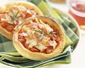 Mini Pizzas with tomatoes — Stock Photo