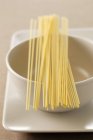 Bunch of uncooked spaghetti pasta — Stock Photo
