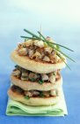 Blinis with snails and chives — Stock Photo