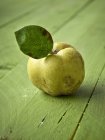 Fresh quince with leaf — Stock Photo