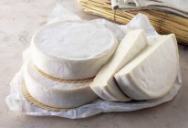 Reblochon cheeses stacked — Stock Photo