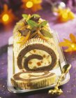 Chocolate and orange rolled log cake — Stock Photo