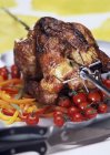 Roasted chicken on skewer — Stock Photo