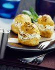 Caraway puffs filled with paprika cream — Stock Photo